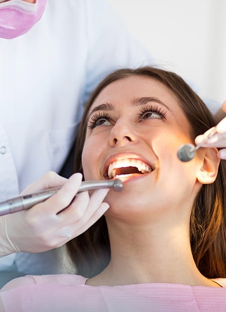 Smiles By Bis thumbnail showing a woman receiving dental treatment